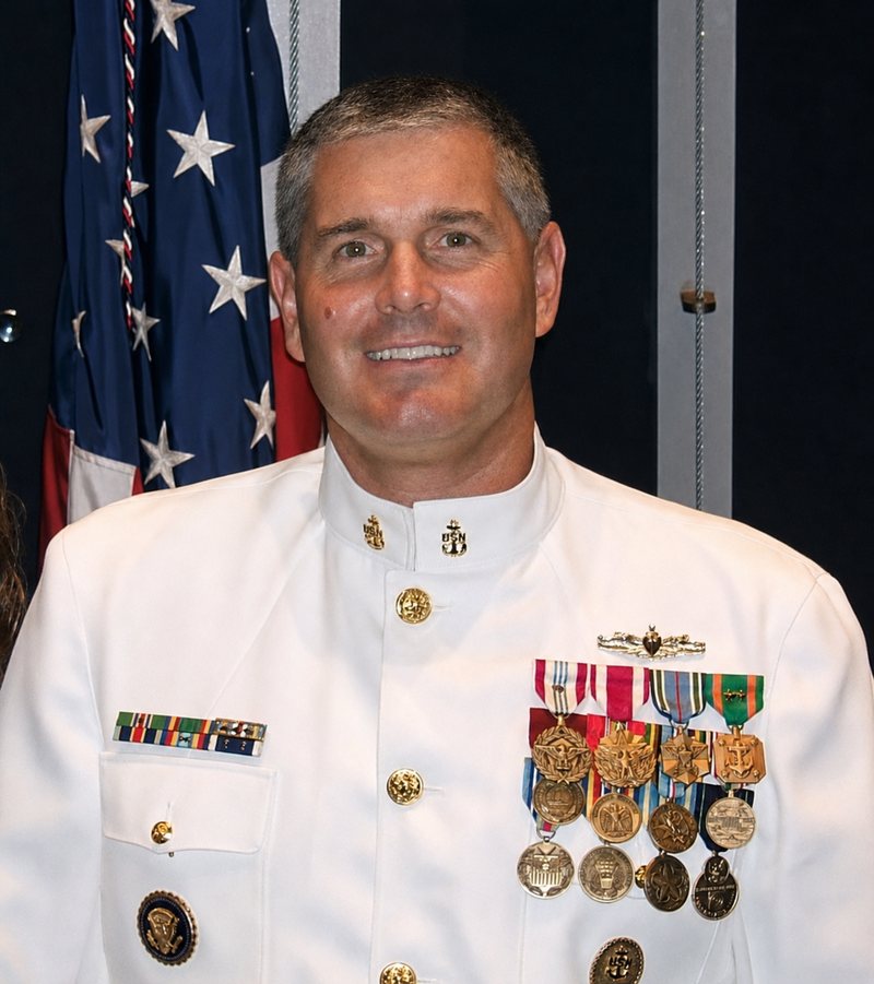 Bill Armour in U.S. Navy dress whites, wearing service ribbons and medals.